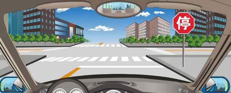 驶近一个图中所示的路口时，必须先停车再重新起步通过路口。配图