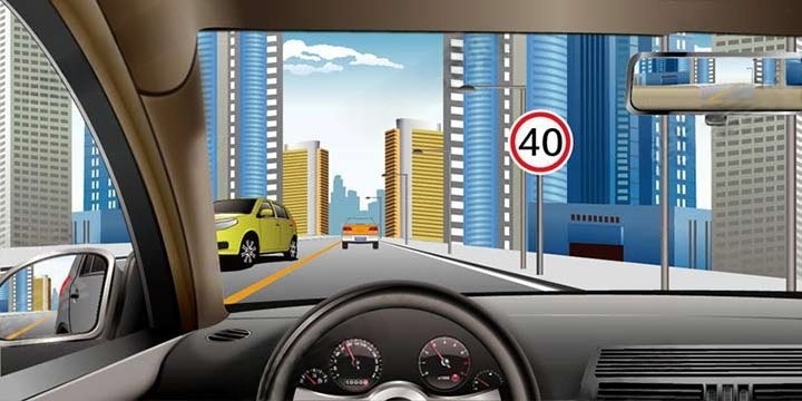 右侧标志表示前方路段解除时速40公里限制。配图